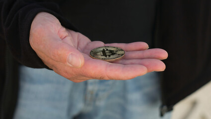 Sticker - Success man holding the gold bitcoin.