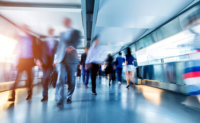 Business people rushing in the lobby