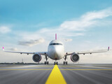 White airplane standing on airport runway ready to takeoff on blue sky background. 3d render. Front view.