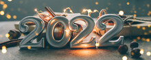 Christmas And New Year Card. Number 2022 On Holiday Background. Christmas Lights Bokeh Background. Banner Image For Design, Web Page