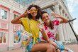 © mary_markevich - happy young girls friends smiling sitting in street
