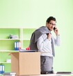© Elnur - Male employee collecting his stuff after redundancy
