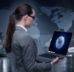 Poster - Businesswoman with laptop in global business concept