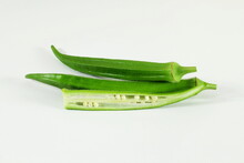 Fresh Okra Vegetable Isolated With Cut Slice On White Background