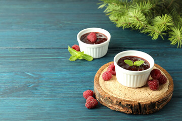 Wall Mural - Concept of tasty food with raspberry jam on wooden background