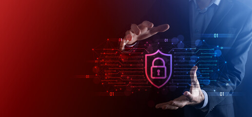 Protection network security computer and safe your data concept, Businessman holding shield protect icon. lock symbol, concept about security, cybersecurity and protection against dangers