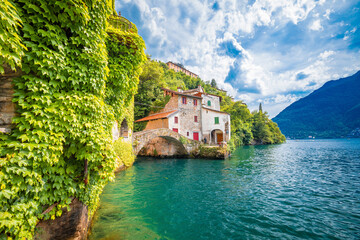 Wall Mural - Town of Nesso historic stone bridge and scenic lakefront view