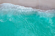 砂浜に打ち寄せる波　青く透き通った海　イメージカット 