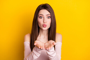 Poster - Photo of optimistic brunette lady blow kiss wear pink shirt isolated on yellow color background