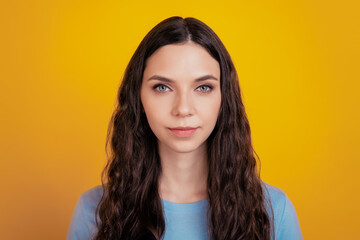 Photo of young attractive girl happy positive smile confident wear casual outfit isolated over yellow color background