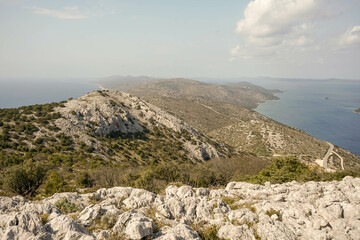 Poster - Beautiful view of an island surrounded by lakes from a natural elevation in Croatia