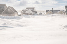 Unplowed Roads After A Blizzard In A North American Suburban Neighborhood.
