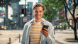 Portrait of a Handsome Young Man Wearing Casual Clothes and Using Smartphone on the Urban Street. Manager in Big City Connecting with People Online, Messaging and Browsing Internet.