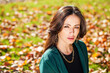 © Andrey_Arkusha - Portrait of a young beautiful brunette woman in autumn park