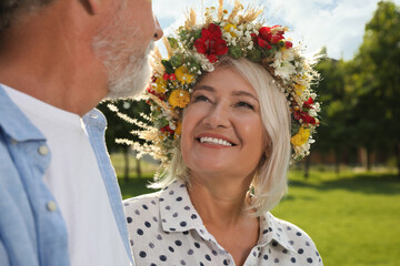 Poster - Lovely mature couple spending time together in park