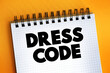 © dizain - Dress Code text on notepad, concept background.