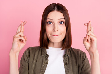 Wall Mural - Photo of nervous bob hairdo millennial lady crossed fingers wear jeans shirt isolated on pink color background