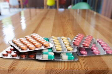 Wall Mural - Pile of tablets in blister packs. Package. Pharmacy and medicine concept.