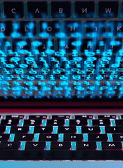 Computer virus infecting a laptop computer with a virus