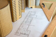 © Westend61 - Architectural model and plan on table