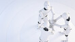© Anna Huber/Westend61 - Rendering of three robots stacking hands