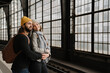 © Hernandez and Sorokina/Westend61 - Young couple waiting at the station platform, Berlin, Germany