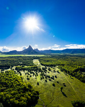 Mauritius, Black River, Flic-en-Flac, Aerial View Of Summer Sun Shining Over Green Coastal Landscape And Distant Trois Mamelles Mountain