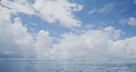 Poster - White cloud blue sky and the sea