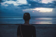 © Christophe Papke/Westend61 - Rear view of woman on the beach at sunset, Koh Lanta, Thailand