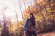 © Studio 27/Westend61 - Woman wearing red woolly hat and denim jacket