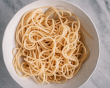 Overhead View Of A Bowl Of Cooked Spaghetti Without Sauce