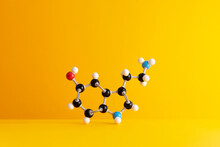 Caffeine Formula's Molecular Structure Over Yellow Background