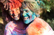 © Eloisa Ramos/Westend61 - Happy couple celebrating Holi festival. Festival of colors