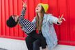 © Eloisa Ramos/Westend61 - Teenage girl and younger sister having fun together