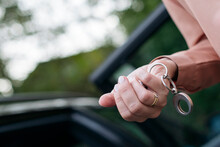 Woman's Hand Holding Car Key, Close-up