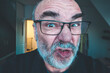 © Frank Roeder/Westend61 - Portrait of grimacing senior man