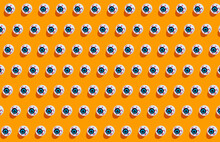 Fake Scary Eyeballs For Halloween On Orange Background