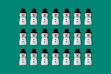 Christmas Snowmen Pattern Against Green Background