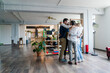 © Giorgio Fochesato/Westend61 - Business team huddling in loft office