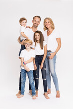 Happy Family With Children Against White Background