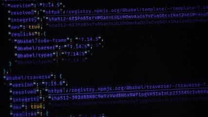 Wall Mural - computer blue code running over black screen of laptop