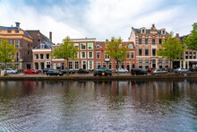 Netherlands, North Holland, Haarlem, Parked Cars And Historic Houses Along Binnen Sparne Canal
