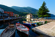 Italy, Trentino, Torbole, Lake Garda, Boats Moored In Harbor