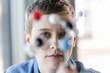 © UWE_UMSTAETTER/Westend61 - Portrait of woman with molecule model