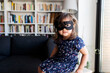 © VALENTINA BARRETO PHOTOGRAPHY/Westend61 - Portrait of little girl wearing mask at home