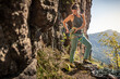 © Manuel Sulzer/Westend61 - Woman preparing to climb