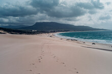 Spain, Tarifa, Beach With Footmarks In The Sand