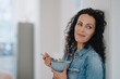 © KNSY/Westend61 - Beautiful woman having healthy breakfast, eating granola