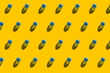 Pattern Of Blue Marbles Against Yellow Background