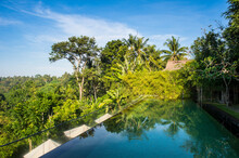 Indonesia, Bali, Ubud, Overflowing Pool In The Kamandalu Ubud Resort